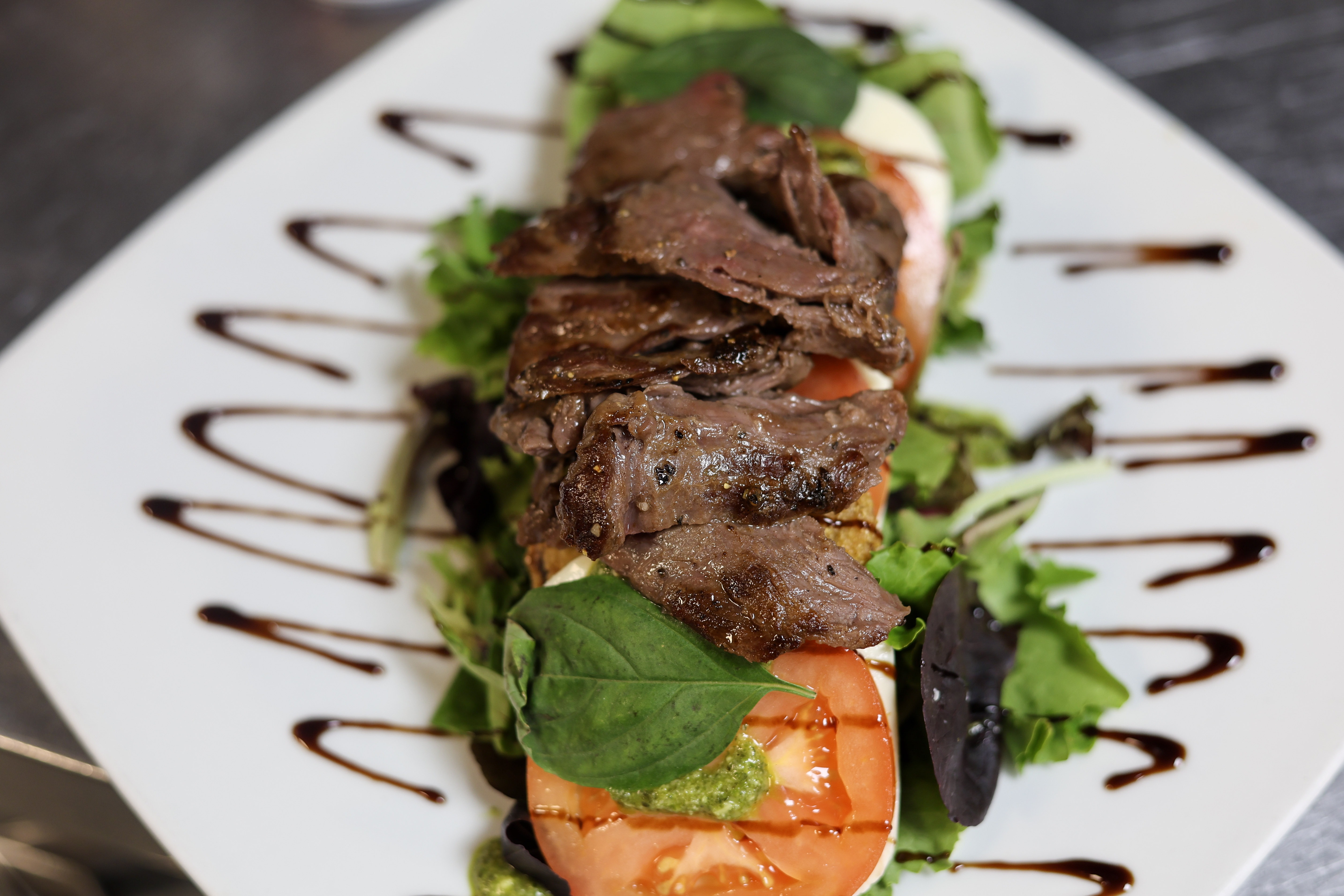 Caprese Salad with added skirt steak at DBK