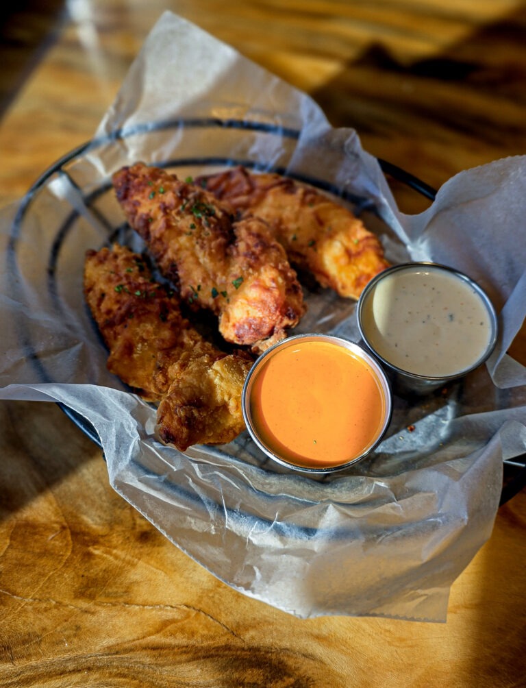 District Bar and Kitchen's Fat Fingers - Battered Chicken Fingers with seasonings and dips.