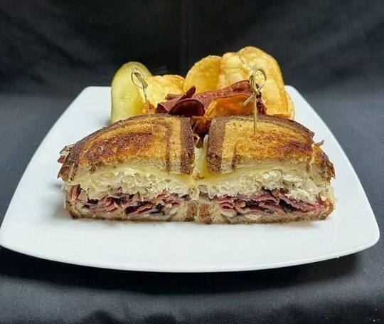 Boradway Reuben - Shaved Smoked Pastrami, Sauerkraut, Swiss Cheese, 1,000 Island Dressing, Grilled Rye Bread